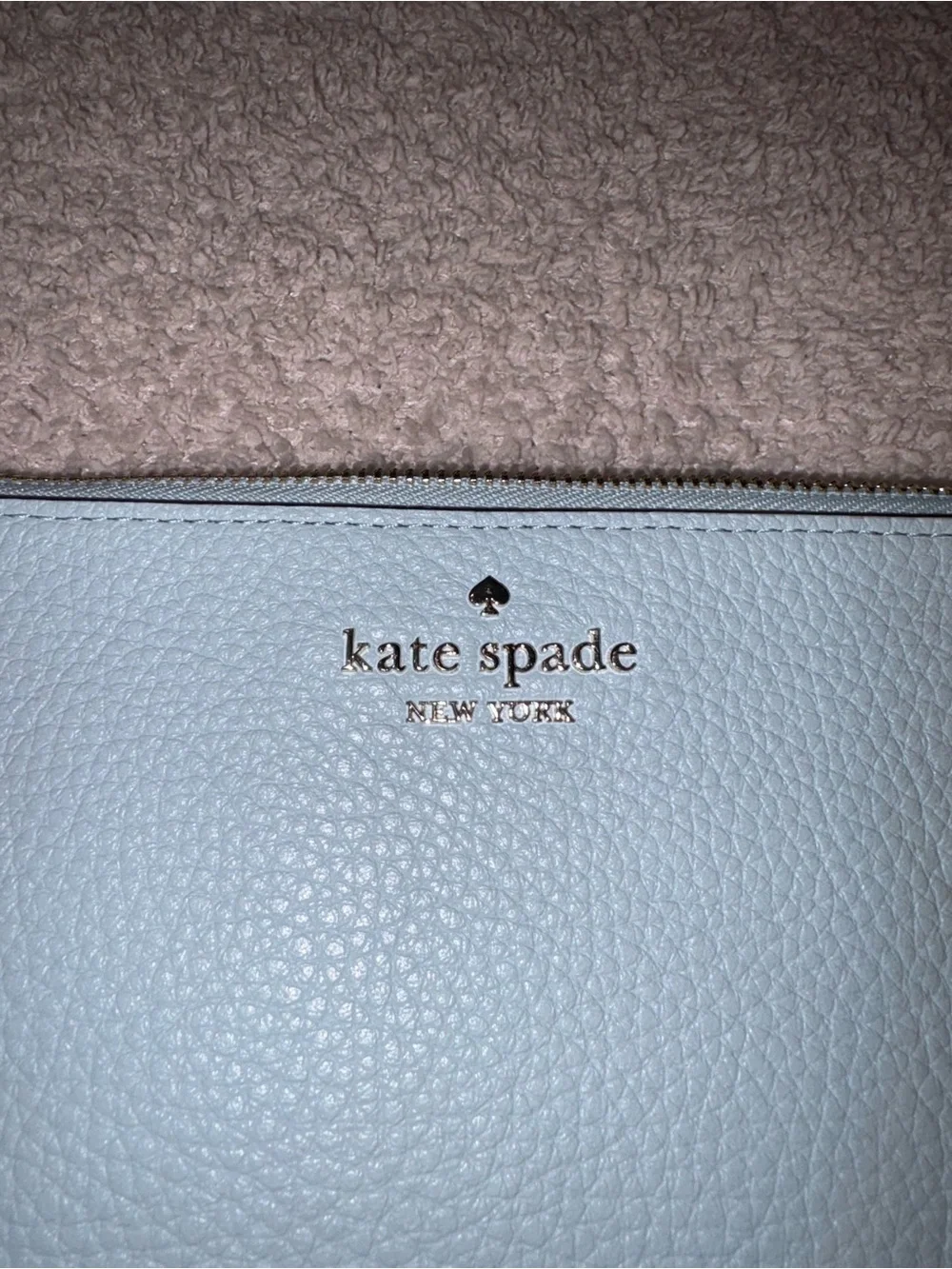 kate spade light blue pebbled leather wristlet phone case